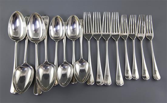 Sixteen items of George V silver Hanovarian rat tail pattern flatware, 36 oz.